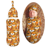 Muishi Tigers swaddle blanket with playful tiger print for cozy newborn comfort
