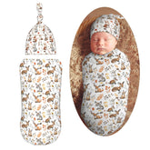 Muishi woodland animals swaddle blanket close-up, ultra-soft fabric for newborn comfort.