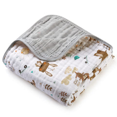 MUKIN baby blanket in muslin softness close-up, ideal for gentle newborn cuddles.