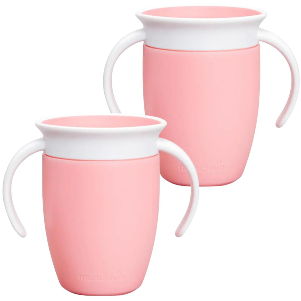 Munchkin Miracle 360 cups in rose with spoutless design for spill-free sipping.