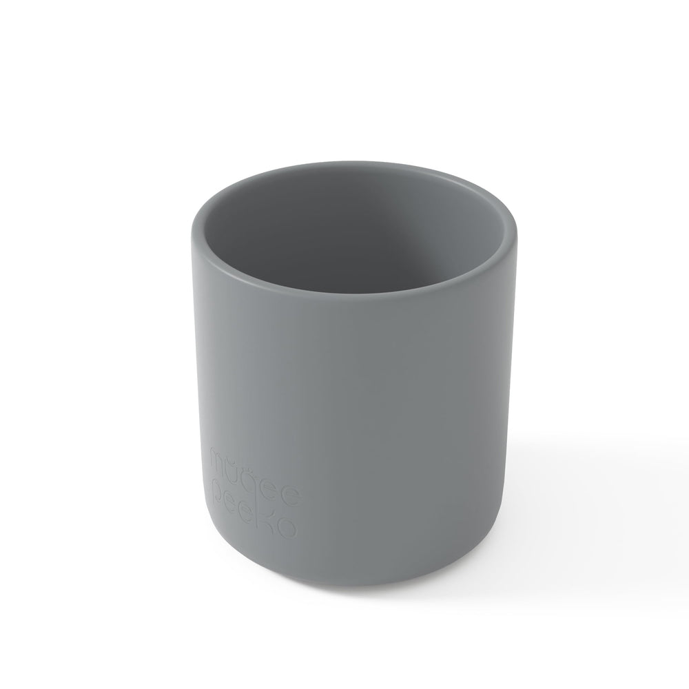 Muqee Peeko baby cup in pebble gray with easy-grip design for independent feeding