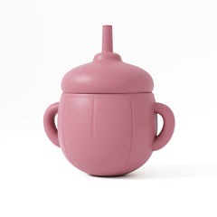 Muqee Peeko pink sippy cup with pumpkin design enhances mealtime fun and hydration.