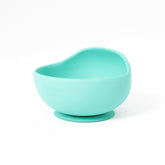 Muqee Peeko suction bowl on table reduces spills during mealtime