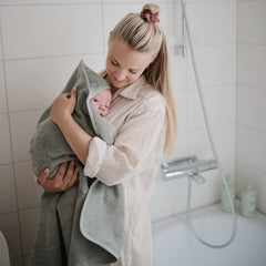 Mushie Hooded Towel Moss folded to reveal generous size