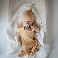 Mushie Baby Hooded Towel Pearl fabric texture closeup emphasizes breathable cotton.