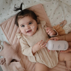 Soft lavender scent from Mushie lotion for soothing baby routines.