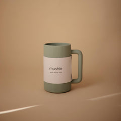 Mushie Bath Rinse Cup handle shown for secure grip during bath