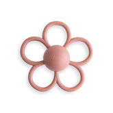 Mushie Daisy Rattle in Dusty Rose close-up showing soft silicone texture for soothing gums.