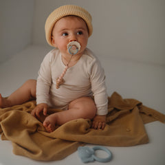 Mushie Eva two-tone silicone beads offer chic, soothing look.