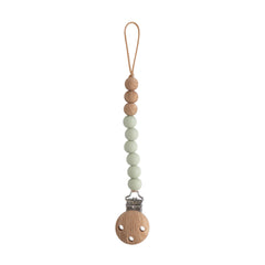 Mushie Eva Sage pacifier clip closeup with silicone beads for mess-free access
