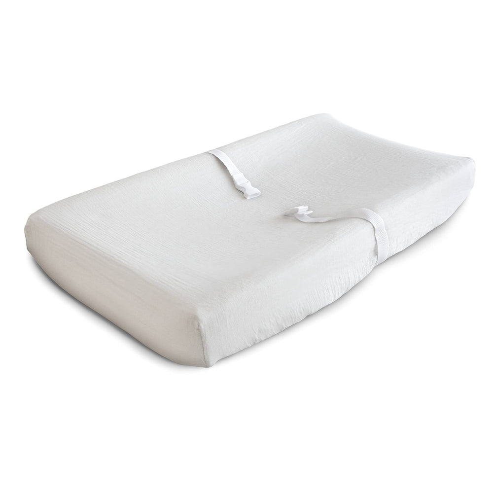 Mushie extra soft muslin fitted changing pad cover in white for gentle newborn skin