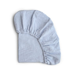 Mushie extra-soft muslin Mini crib sheet baby blue top view for cozy nights