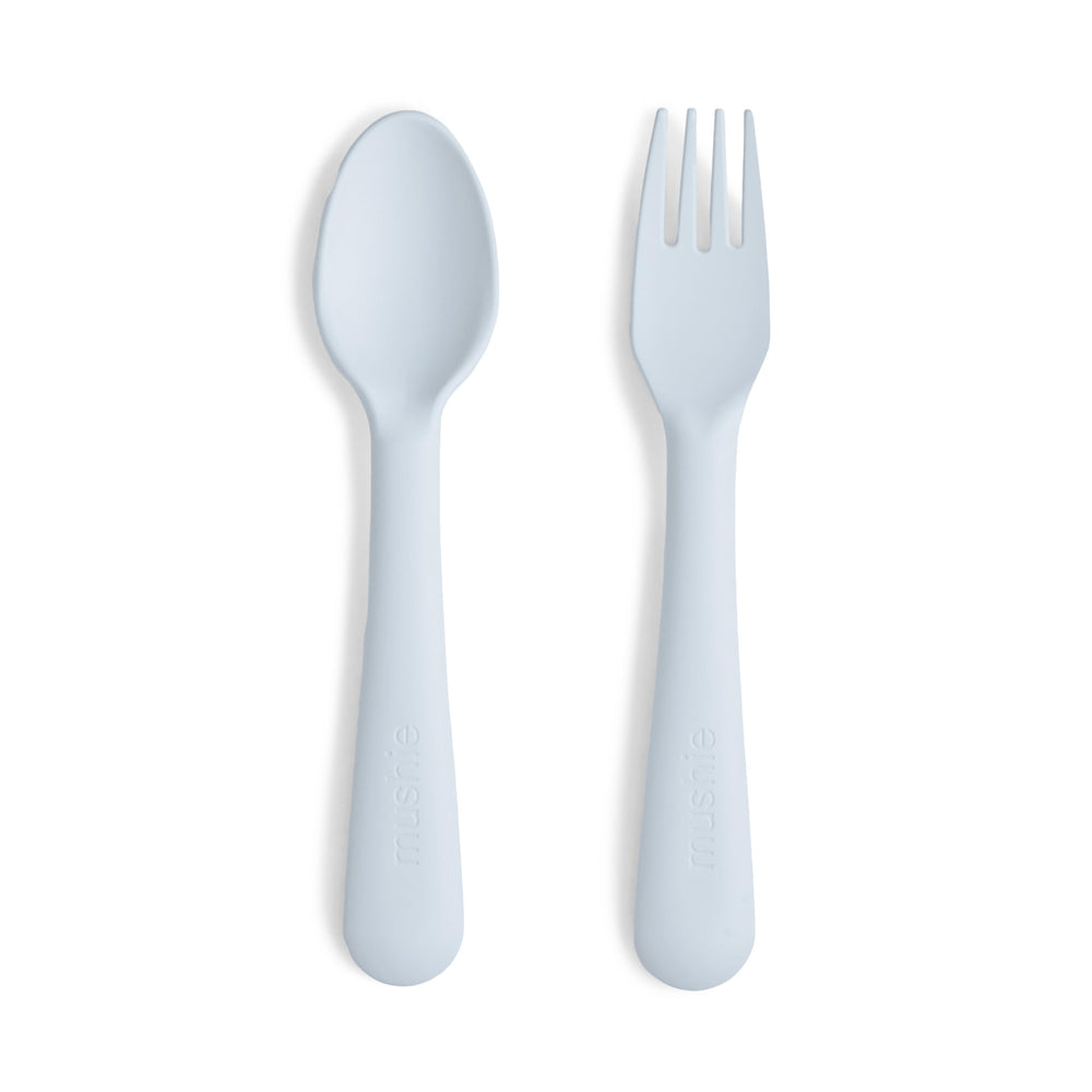 Mushie flatware fork in powder blue close-up, ergonomic grip for little hands.