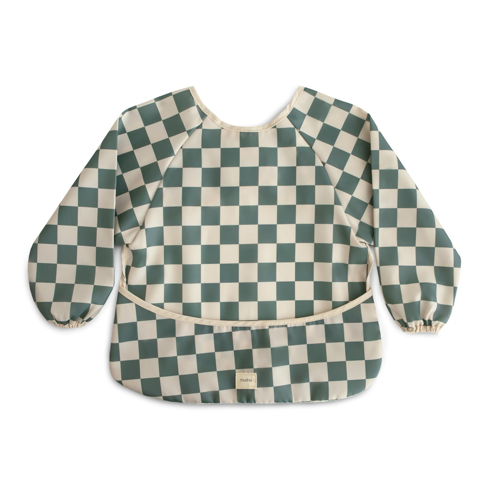 Mushie long sleeve bib Olive Check closeup shows water-resistant fabric for messier moments