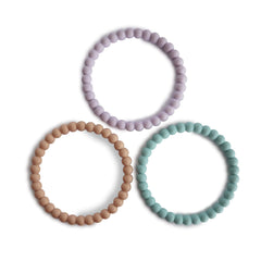 Mushie Pearl Teether Bracelet in lilac; soothing silicone for gentle chewing