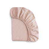 Mushie Stretchy Mini Crib Sheet blush closeup knit texture for gentle softness