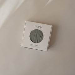 Close-up of Mushie fabric texture showing ultra-soft modal blend.