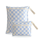 Mushie water-resistant wet bag blue-check large zipper for secure wet items.
