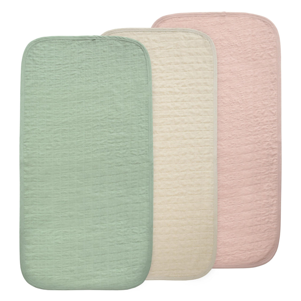 Mushie waterproof changing pad liner blush combo for tidy changes and comfort.