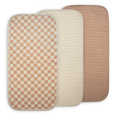 Mushie waterproof changing pad liner natural check set, keeps diaper changes cleaner.