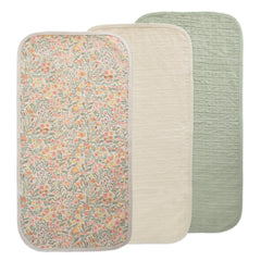 Mushie waterproof changing pad liner pastel blooms top view, keeps diaper area clean during changes