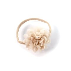 My Lello natural beige petal headband adds soft charm to everyday outfits.