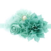 My Lello baby headband with shabby-flower cluster in aqua for newborn photo sessions.