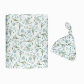 MY LITTLE ZONE botanical blue swaddle blanket offers soft, stretchy comfort for newborns.