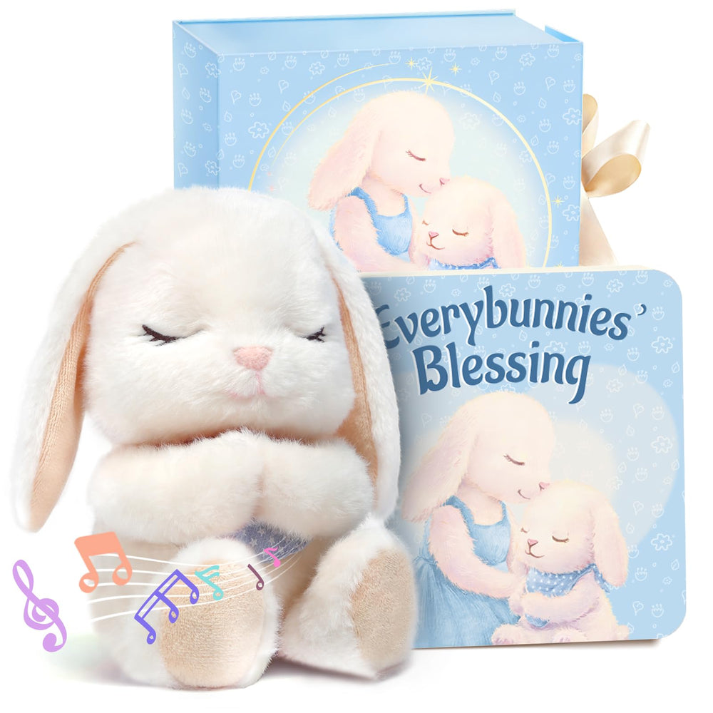 MyMateZoe 9-inch musical praying bunny plush beside a crib for bedtime