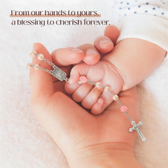 MyMateZoe silver cross atop pink keepsake box for sacred moments