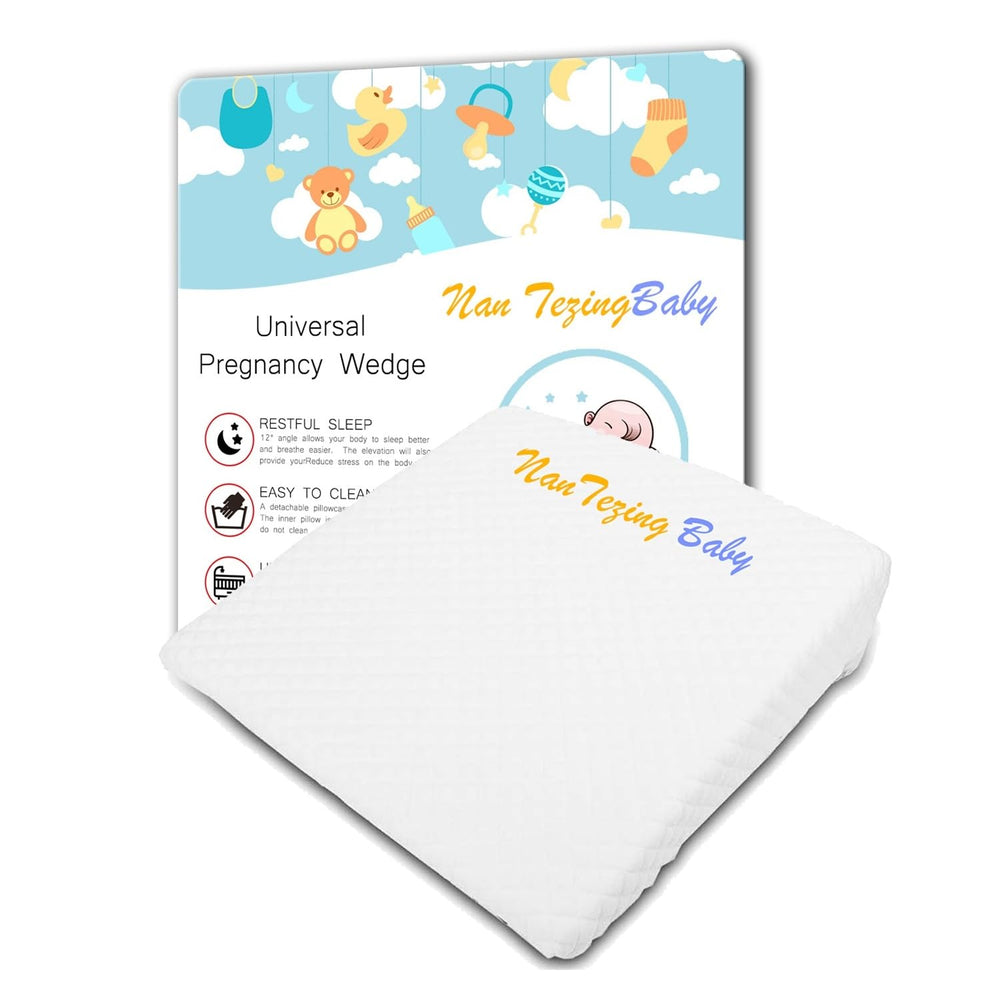 NAN TEZINGBABY pregnancy wedge pillow in side view on a bed for comfort