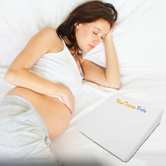 NAN TEZINGBABY wedge pillow on bed for lounging and support