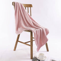 Close-up of NANPIPER reversible plush blanket showing double-sided softness.