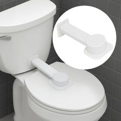 NANZO toilet lock on a flat lid showing secure adhesive base.