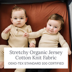Natemia fitted pack and play sheet shows deep pockets and elastic edge for snug fits