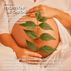 Natura Mom & Baby shower oil being applied to demonstrate circular massage.