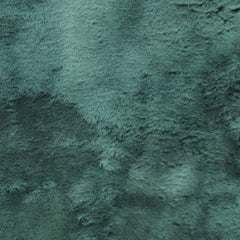 Natural Design Emerald sheepskin bed pad in use for breathable comfort and pressure relief