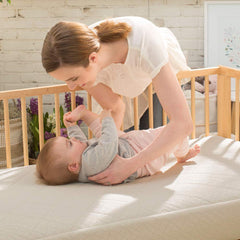 Naturepedic Organic 2-Stage crib mattress toddler side provides medium firmness for growing infants