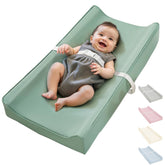 Navari vegan leather waterproof baby changing pad on a dresser with non-slip back for secure diaper changes.