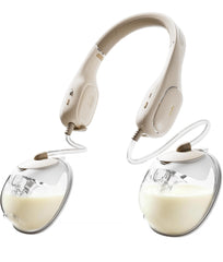 NCVI neckband pump worn around the neck for hands-free pumping on the go.