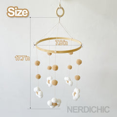 Nerdichic crib mobile with soft felt petals enhances visual interest and nursery decor.