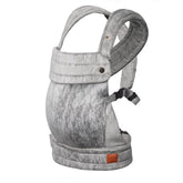 Nest Blanche baby carrier front view showing ergonomic support for growing infants.