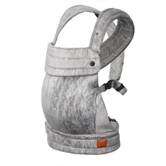 Nest Blanche baby carrier front view showing ergonomic support for growing infants.