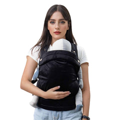 Nest Blanche carrier supports babies 7–35 lbs for growing infants.