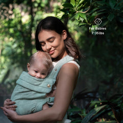 NEST BLANCHE newborn-friendly M-shape seating supports hip alignment.
