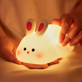 NesveCit big-face rabbit night light glows softly in the nursery.