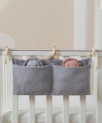 NewLuyer cotton organizer pockets designed for diapers and wipes within arm's reach.