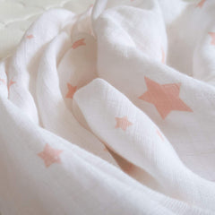Newton Baby elastic-fit view showing snug, secure mini crib mattress compatibility
