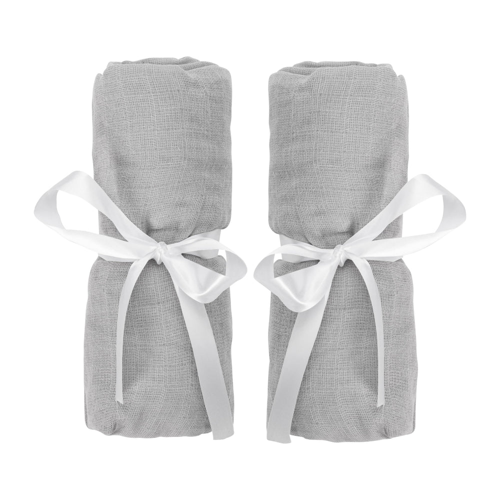 Newton Baby bassinet sheets with secure fit for bedside sleeper