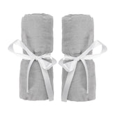 Newton Baby bassinet sheets with secure fit for bedside sleeper